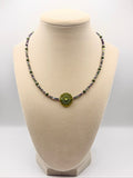 Czech Glass Origami Flower in Peridot AB focal with Czech glass faceted Accents